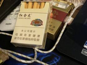 红金龙(新硬红精品)香烟价格表_多少钱一盒1